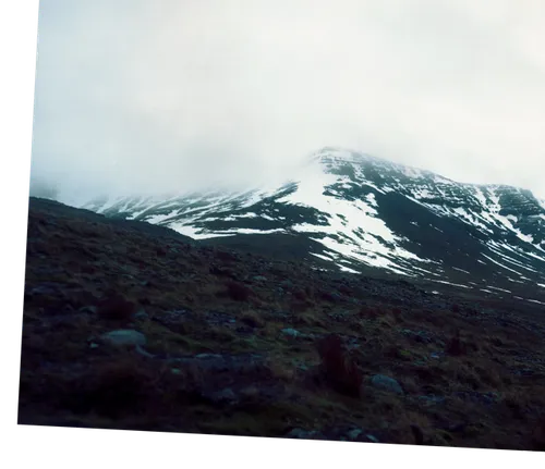Þverfellshorn peak with views of other parts of Esja, and Mosfellsbær and Reykjavík