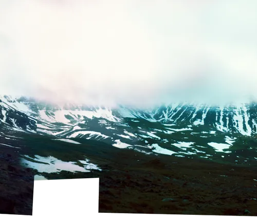 Þverfellshorn peak with views of other parts of Esja, and Mosfellsbær and Reykjavík