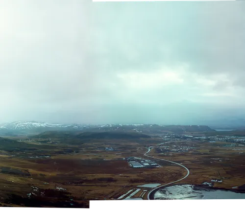 Þverfellshorn peak with views of other parts of Esja, and Mosfellsbær and Reykjavík