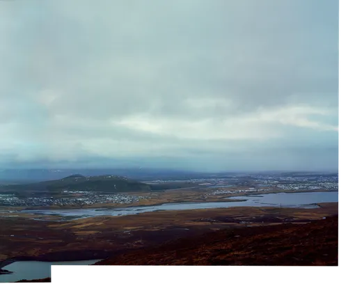 Þverfellshorn peak with views of other parts of Esja, and Mosfellsbær and Reykjavík