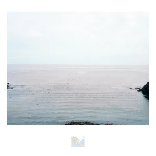 An photograph of a seascape viewed from the island of Grímsey facing west into the Arctic Circle.